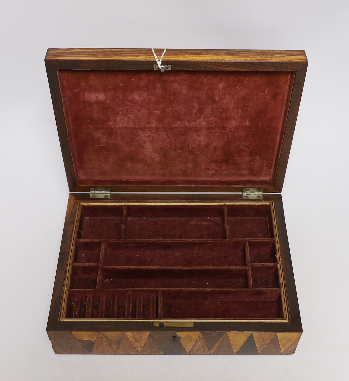 An early 19th century specimen wood perspective cube marquetry jewellery box, 27cm wide, 19.5cm deep, 8cm high